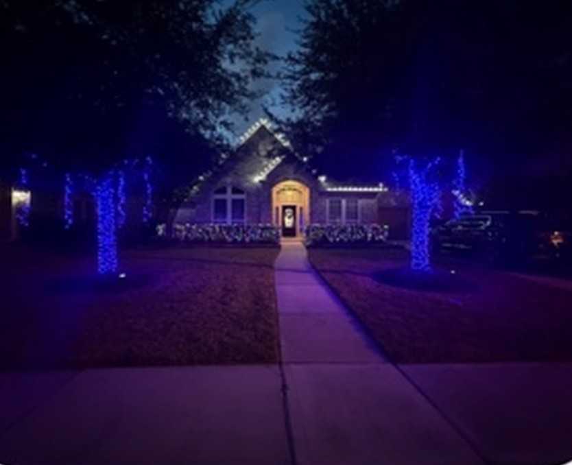 Roofline lighting with colored uplights